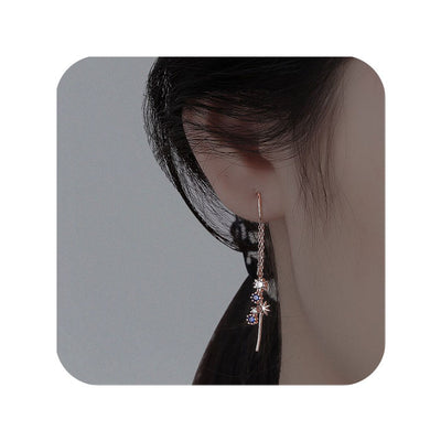 Boucle-d-oreille-chaine-etoile-traversante